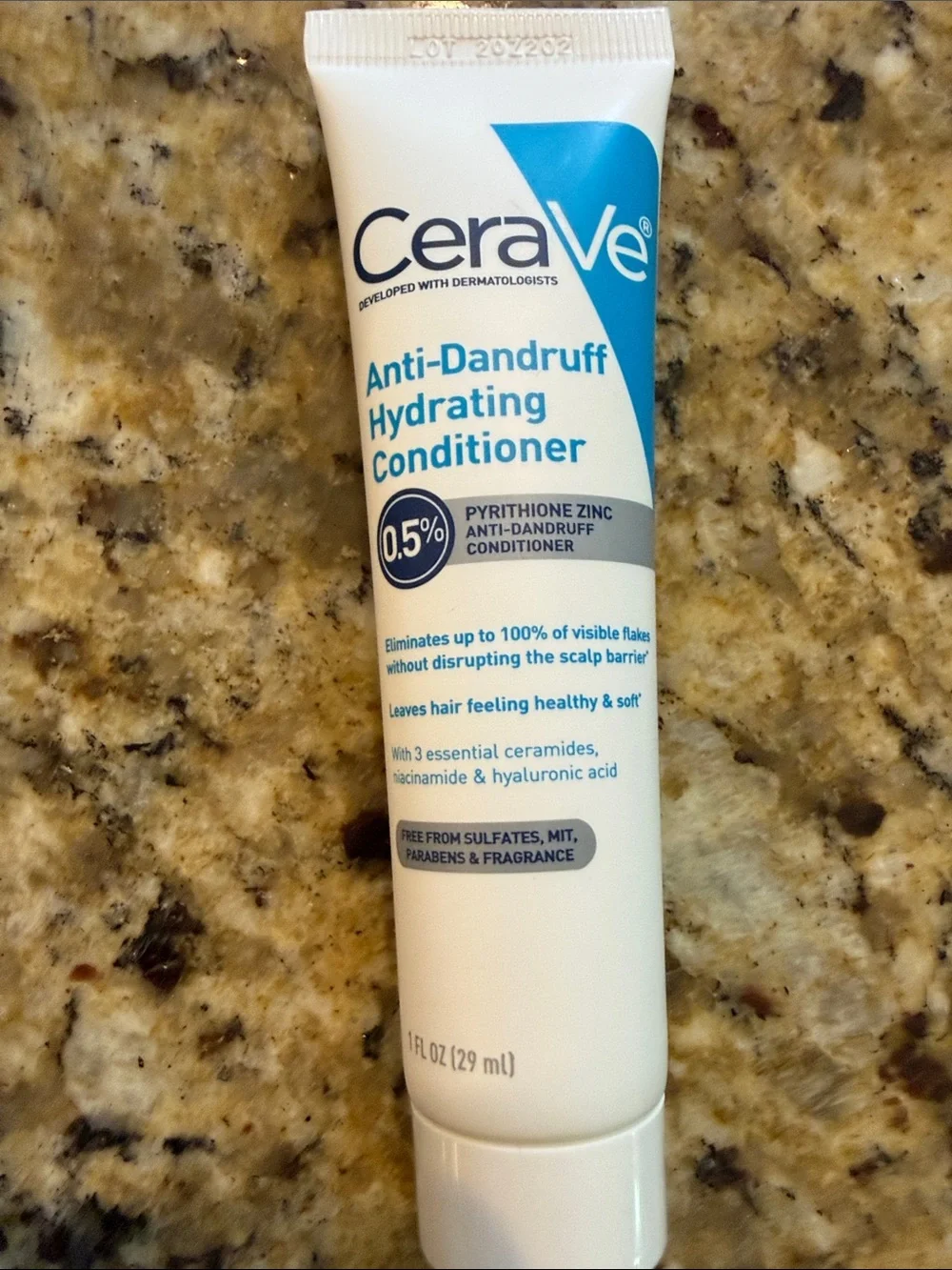 rave White Tube with Blue Accents Shampoo